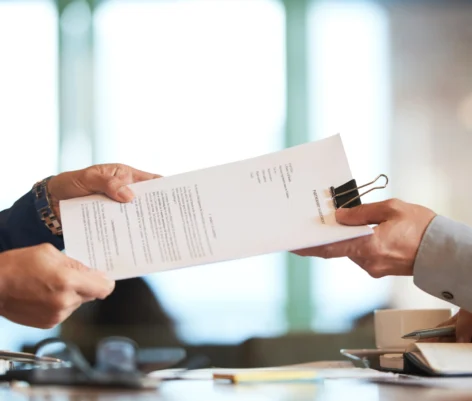 closeup-hands-passing-contract-unrecognizable-businessman