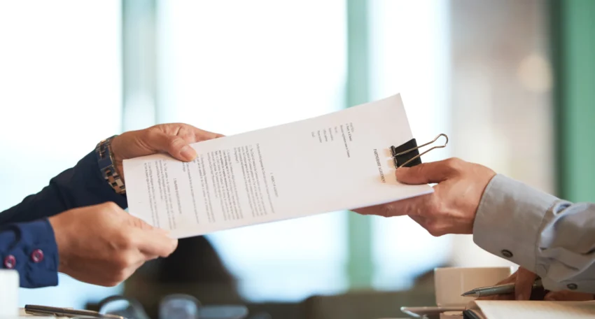 closeup-hands-passing-contract-unrecognizable-businessman