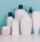 small-plant-near-various-cosmetics-bottles