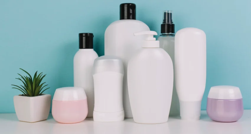 small-plant-near-various-cosmetics-bottles