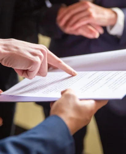 cropped-view-businesswomen-reading-document