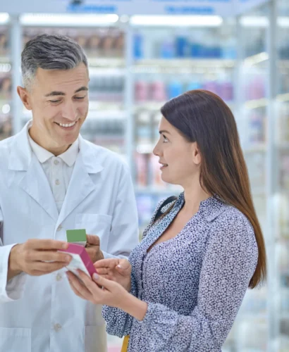 male-expert-consulting-customer-regarding-body-care-products