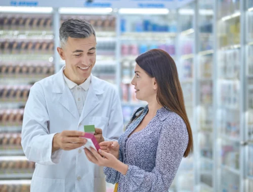 male-expert-consulting-customer-regarding-body-care-products